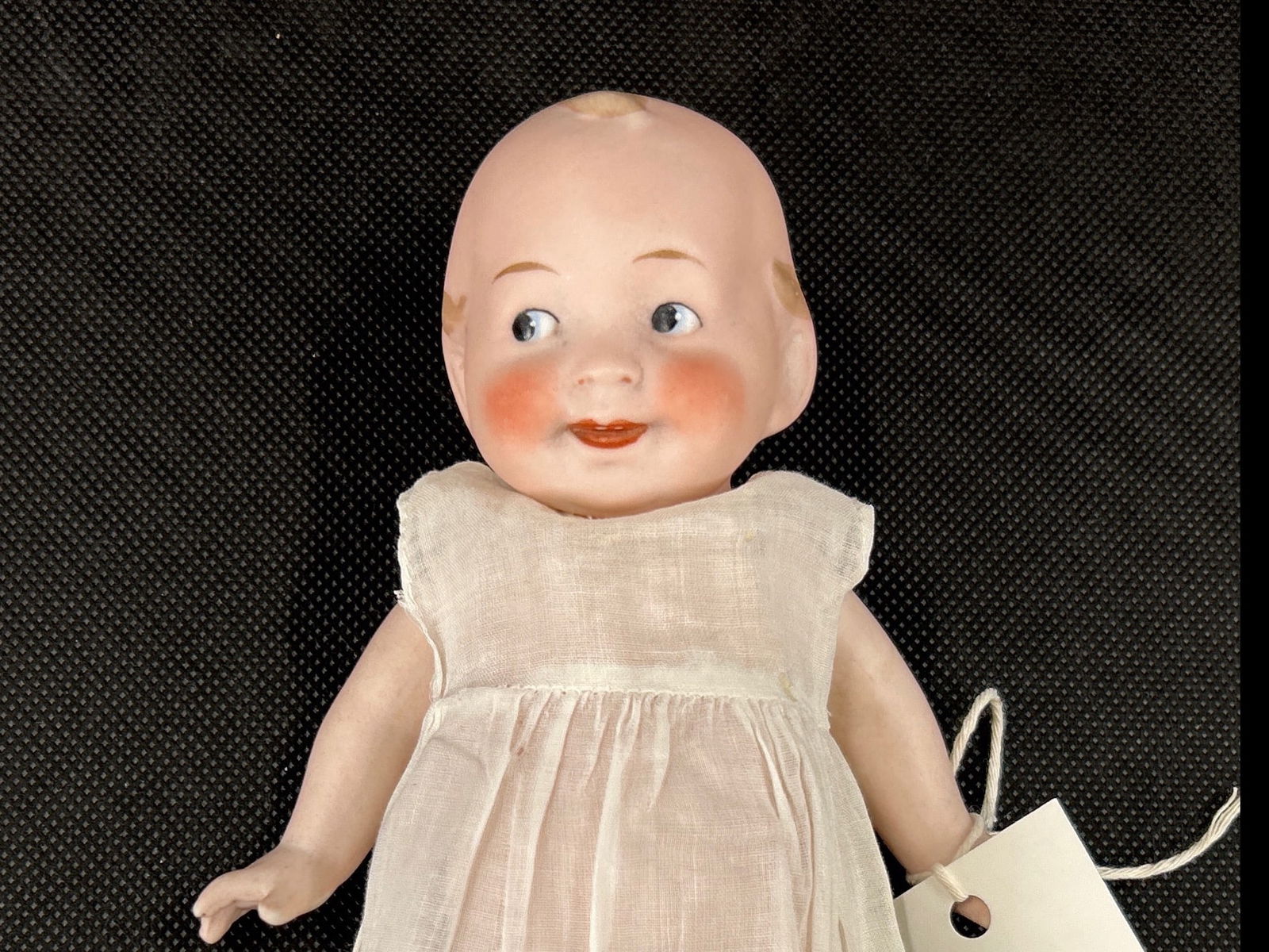 Vintage Bisque Jointed Doll: Vintage Bisque Jointed doll three piece jointed. Jointed arms Painted on eyes teeth and hair Wide awake doll Registered Germany