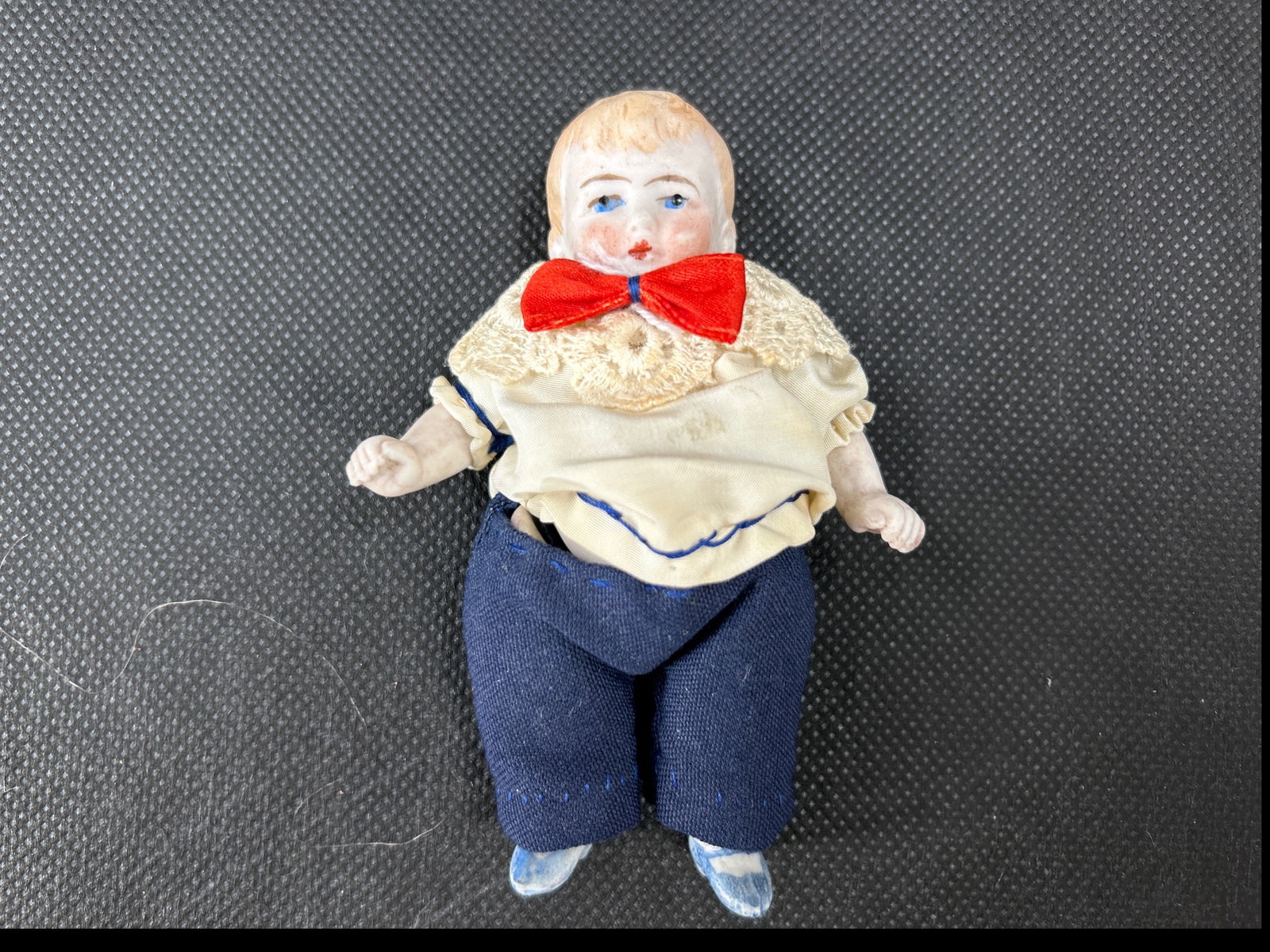 Antique Vintage 4.5" Jointed Doll Germany: Antique Vintage 4.5" Jointed Doll Germany H: 4.5" Blond Molded Hair Painted Blue eyes and painted mouth Painted on shoes and socks Markings: Germany 2
