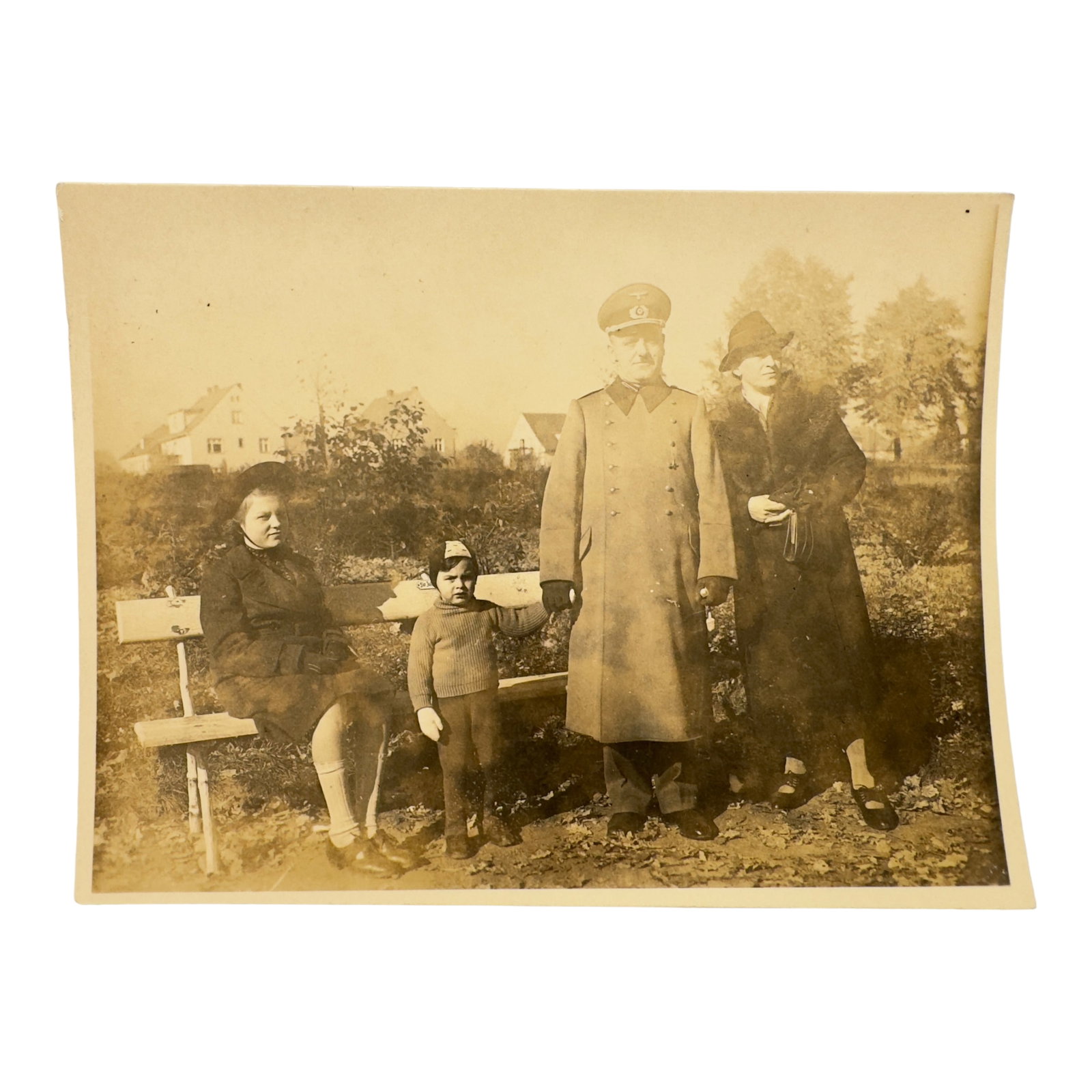 German Officer Family Photo with 'fur Juden' Bench: German Officer Family Photo with 'fur Juden' Bench in background.