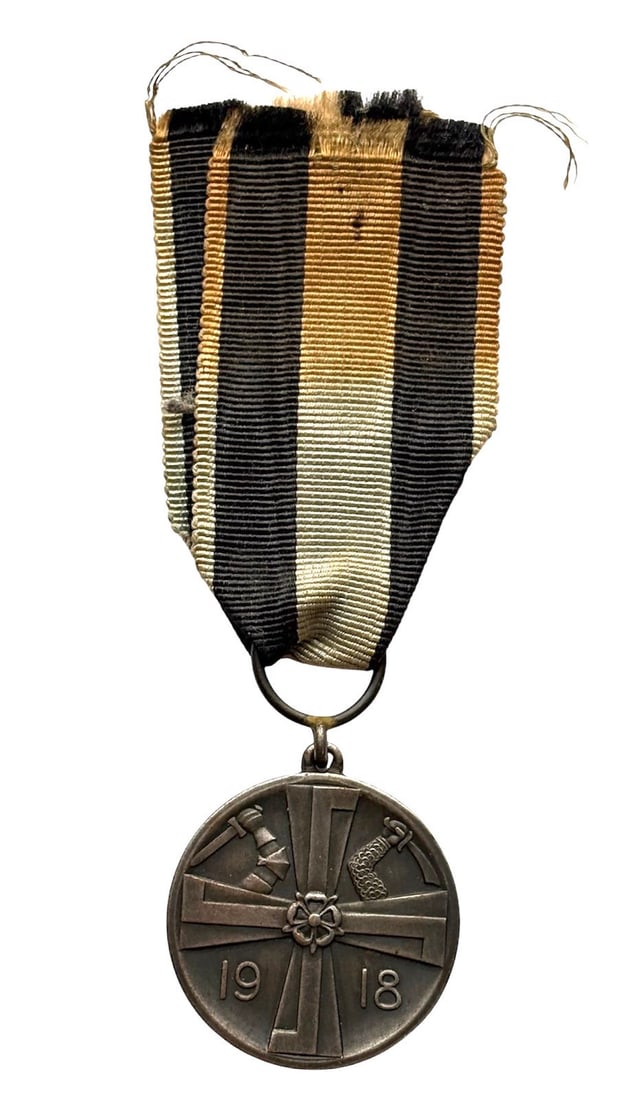 Rare Finnish Civil War Medal from 1918: In great condition. Awarded to the White soldiers who fought the Communists during the Finnish Civil War in 1918. Obverse shows a Swastika and reverse shows a Finnish Lion. Maker Marked. This medal wa