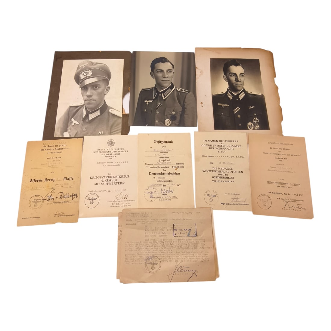 Third Reich Nazi Wehrmacht Officer Photos and Award Documents: Wehrmacht (German Army) document and photograph group from World War II, belonging to a single decorated soldier — likely an NCO (Unteroffizier or Feldwebel) — containing award certificates, photo