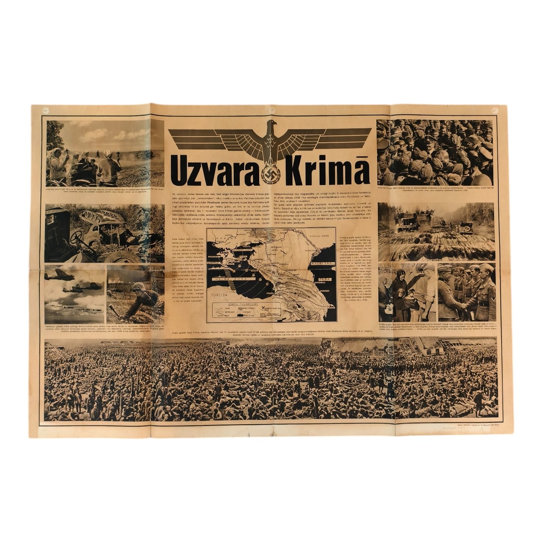 HUGE World War II German Propaganda Poster Victory in Crimea: This is a World War II German propaganda poster, printed in Latvian with the title “Uzvara Krimā” — translated as “Victory in Crimea.” It celebrates the German captu