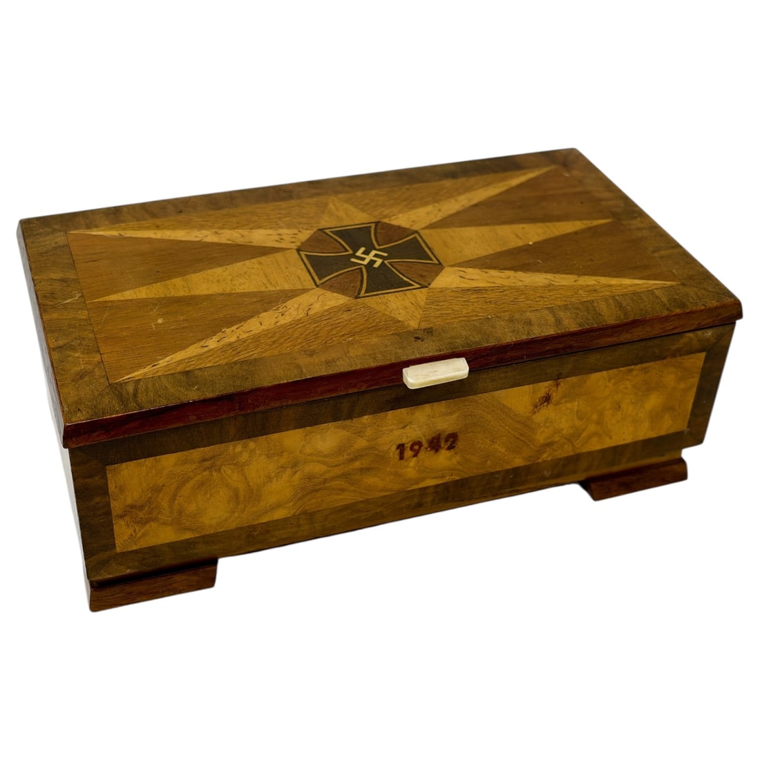 Third Reich Nazi Wood Decorative Box 1942: Third Reich Nazi Wood Decorative Box 1942. On the lid there are four 'rays' that we believe were made from Masur Birch which is only found in Western Russia and Finland. The rest of the box appears to
