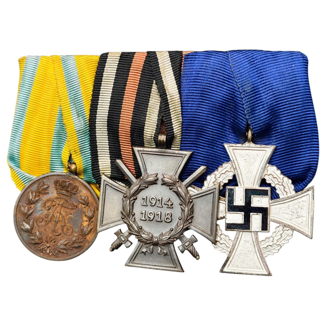 Third Reich Nazi 3 Place Medal Bar: Third Reich Nazi 3 Place Medal Bar including 25 year faithful service and Hindenburg medals.