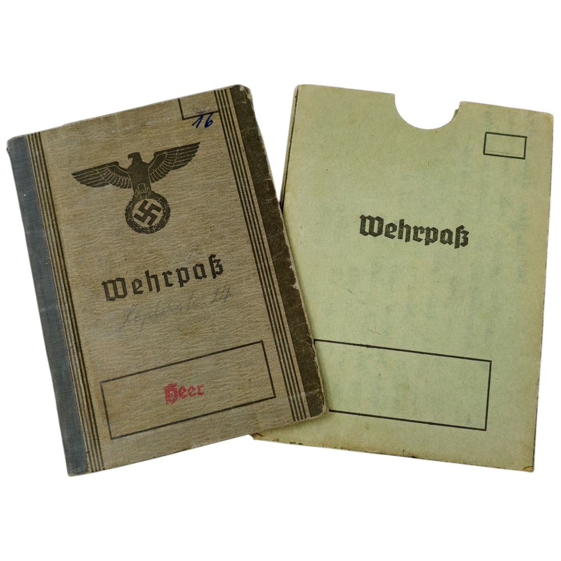 Third Reich Nazi Wehrpass: Original Wehrpaß (military service record book) complete with its rare original protective outer sleeve, issued in 1938 and fully filled out to a named individual.