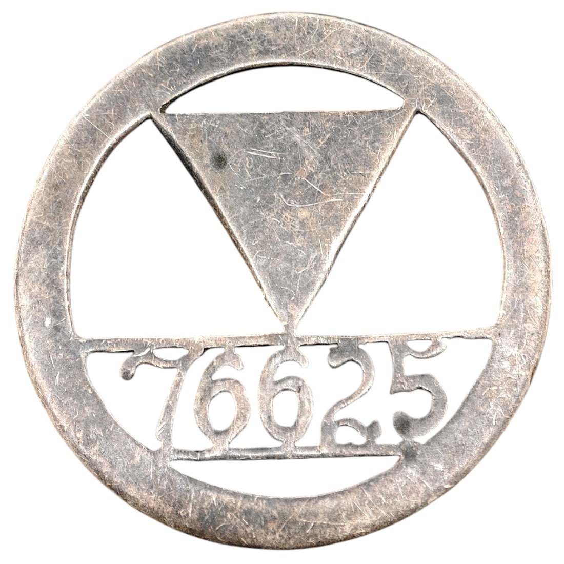 Pierced White-Metal Numbered Disc (Identity/Membership Tag) - Unidentified: A circular pierced disc in a metal believed to be nickel-silver, commemorative in nature and worn by a Holocaust survivor in the postwar period, with the pierced number recalling the identification