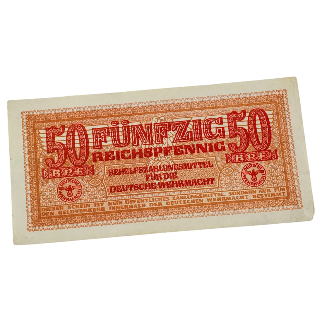 German WWII Wehrmacht 50 Reichspfennig Military Currency Note: A German WWII 'Behelfszahlungsmittel für die Deutsche Wehrmacht' 50 Reichspfennig military scrip note, printed in red/orange with Wehrmacht eagle emblems.