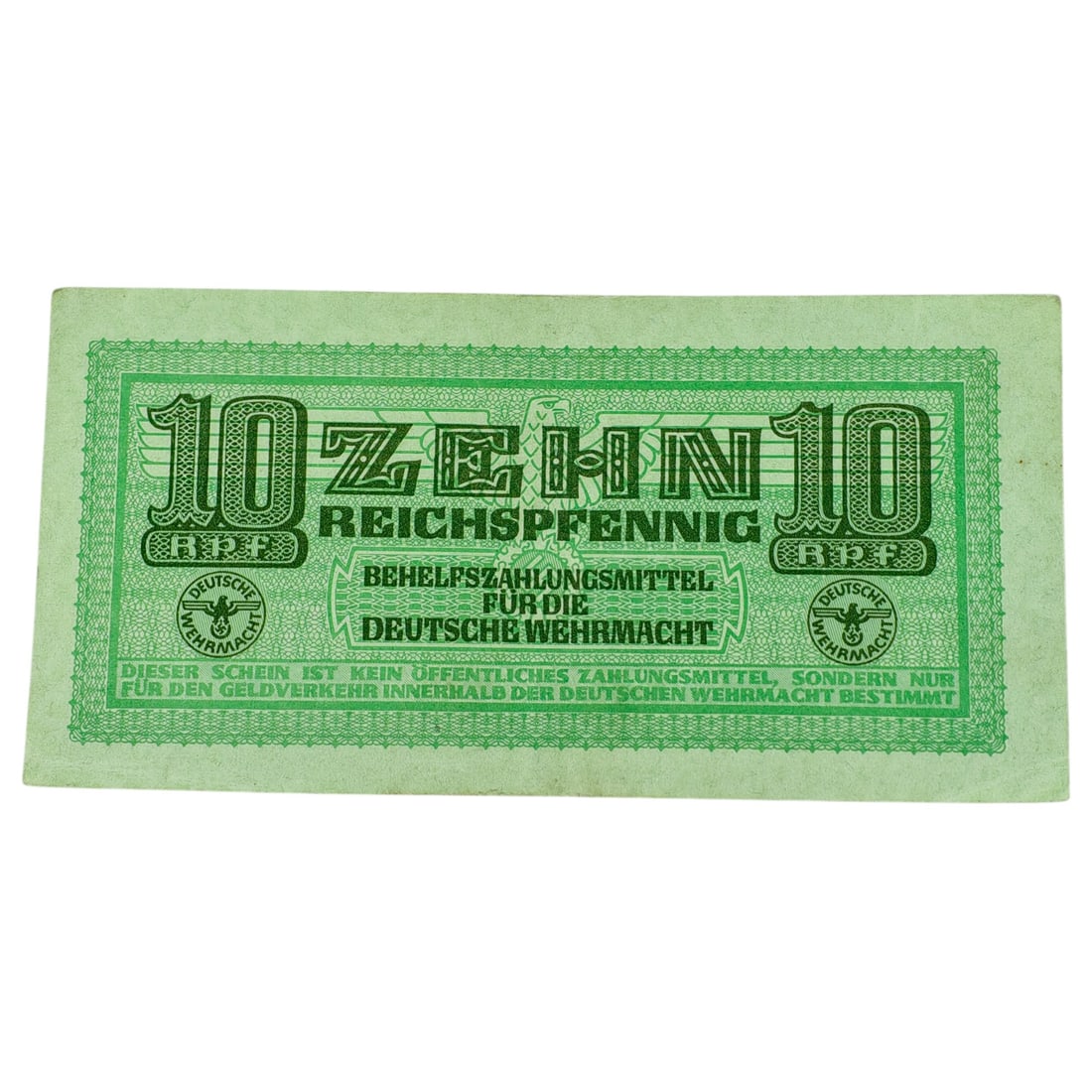 German WWII Wehrmacht 10 Reichspfennig Military Payment Note (Behelfszahlungsmittel): A German WWII-era emergency military scrip note issued for use by the Wehrmacht, denominated as 10 Reichspfennig. Printed in green ink with 'ZEHN REICHSPFENNIG' and 'BEHELFSZAHLUNGSMITTEL FÜR DIE DEU
