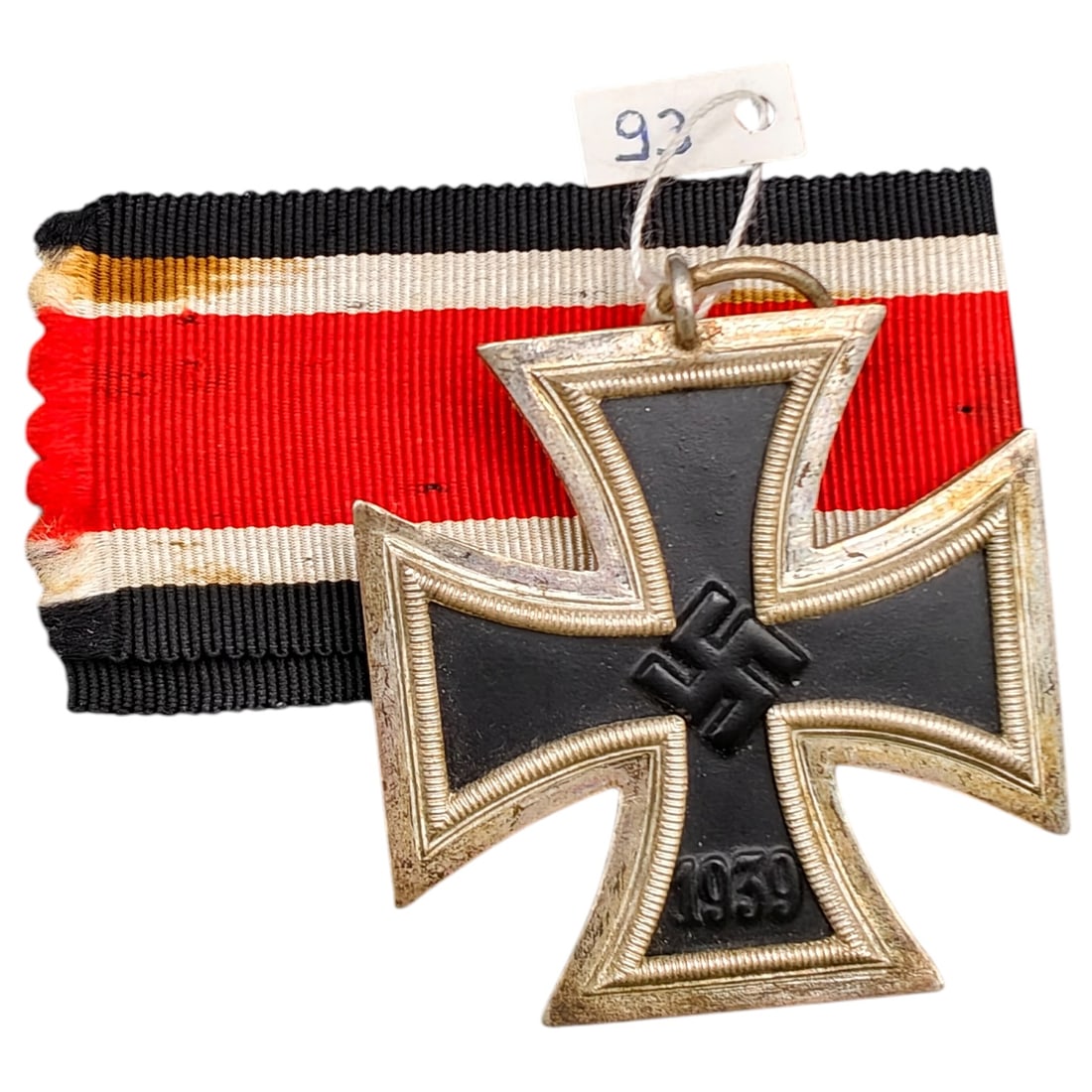 1939 Iron Cross 2nd Class: A World War II German Iron Cross Second Class (Eisernes Kreuz 2. Klasse), dated 1939, obverse featuring a mobile swastika at center and dated 1813 to reverse.