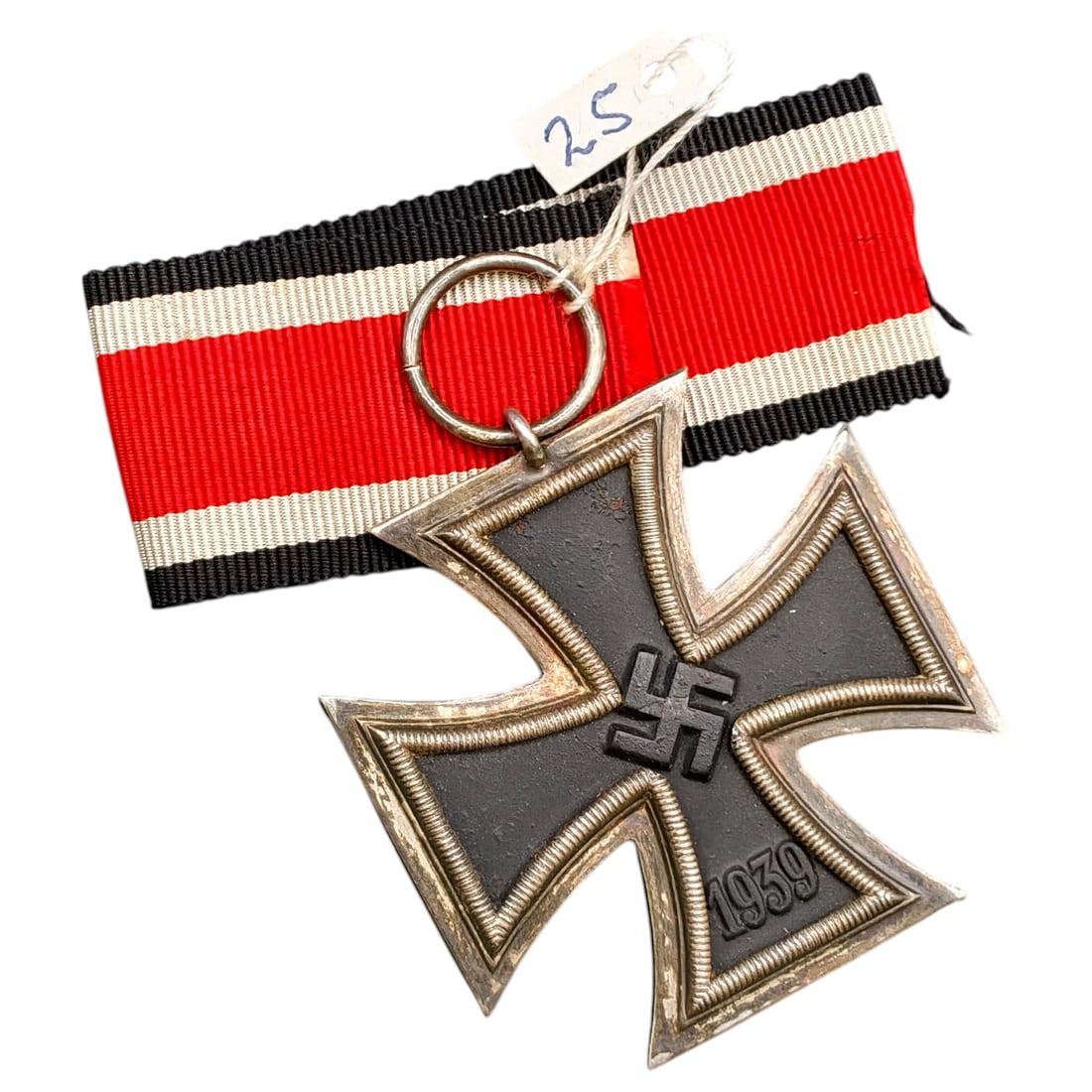 1939 Iron Cross 2nd Class: A World War II German Iron Cross Second Class (Eisernes Kreuz 2. Klasse), dated 1939, obverse featuring a mobile swastika at center and dated 1813 to reverse.