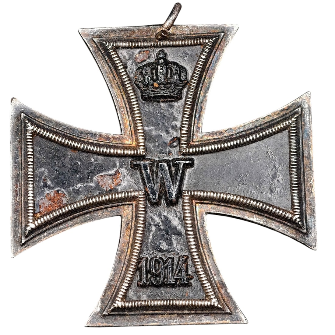 1914 Iron Cross 2nd Class: A WWI-era Iron Cross 2nd Class, dated 1914, with crowned 'W' cypher on the obverse and reverse showing 'FW' cypher, oak leaves, and '1813' commemorating the original 1813 founding of the order.The Iro