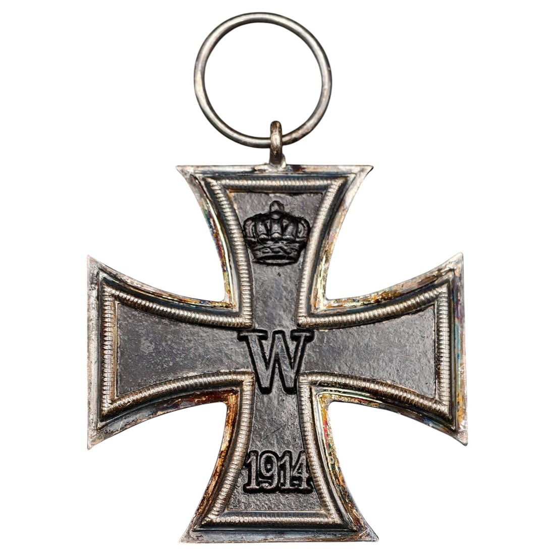 1914 Iron Cross 2nd Class: A WWI-era Iron Cross 2nd Class, dated 1914, with crowned 'W' cypher on the obverse and reverse showing 'FW' cypher, oak leaves, and '1813' commemorating the original 1813 founding of the order.The Iro