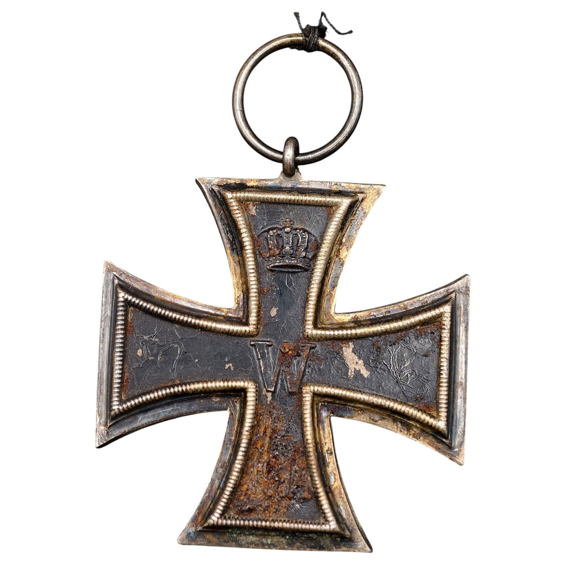 1914 Iron Cross 2nd Class: A WWI-era Iron Cross 2nd Class, dated 1914, with crowned 'W' cypher on the obverse and reverse showing 'FW' cypher, oak leaves, and '1813' commemorating the original 1813 founding of the order.The Iro
