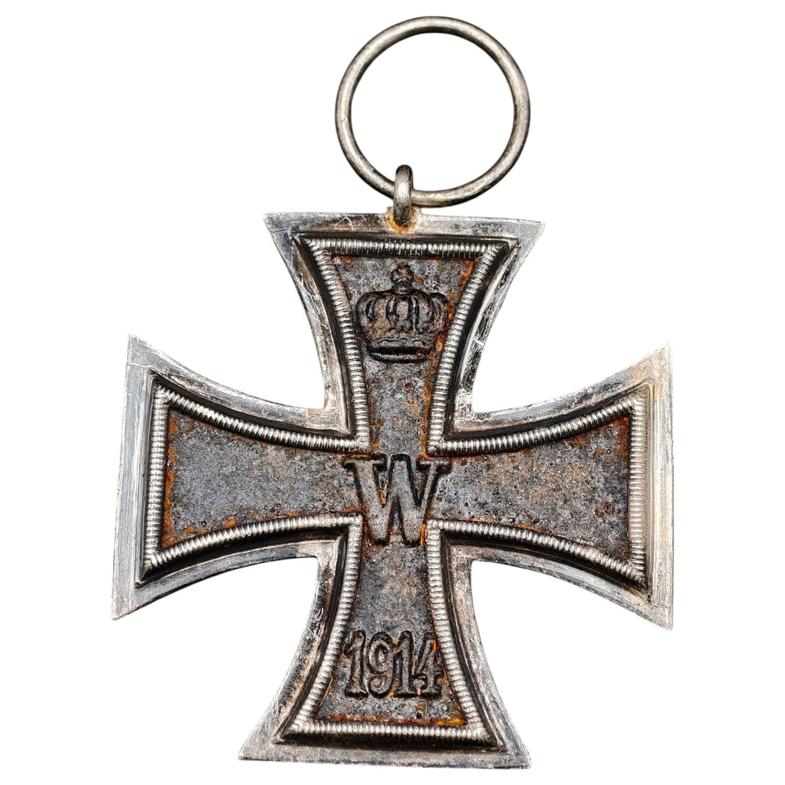 1914 Iron Cross 2nd Class: A WWI-era Iron Cross 2nd Class, dated 1914, with crowned 'W' cypher on the obverse and reverse showing 'FW' cypher, oak leaves, and '1813' commemorating the original 1813 founding of the order.The