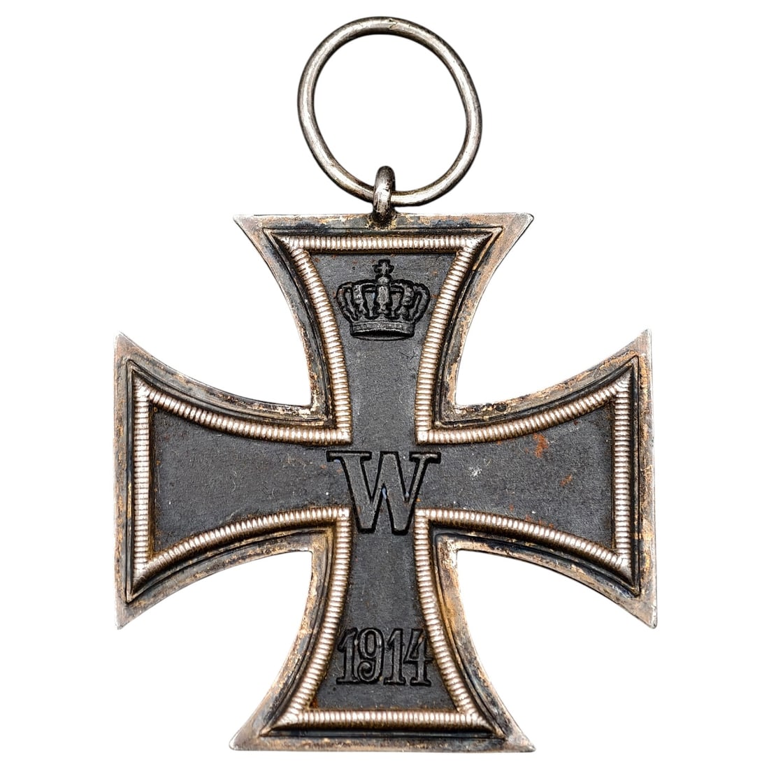 1914 Iron Cross 2nd Class: A WWI-era Iron Cross 2nd Class, dated 1914, with crowned 'W' cypher on the obverse and reverse showing 'FW' cypher, oak leaves, and '1813' commemorating the original 1813 founding of the order.The Iro