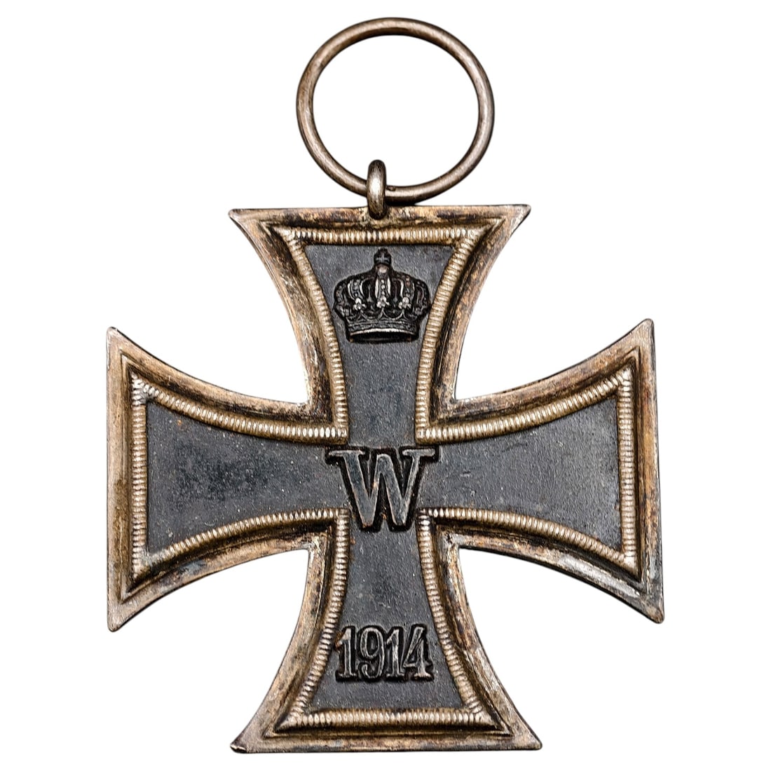 1914 Iron Cross 2nd Class: A WWI-era Iron Cross 2nd Class, dated 1914, with crowned 'W' cypher on the obverse and reverse showing 'FW' cypher, oak leaves, and '1813' commemorating the original 1813 founding of the order.The Iro