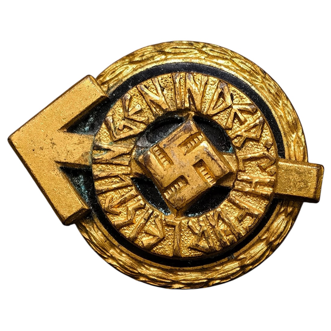 HJ Leaders Sports Badge in Gold: A gilt-finished Hitler Youth Gau-level sports/proficiency badge featuring a central swastika within a sunburst pattern, surrounded by a runic-style inscription and oak leaf wreath border, with a direc