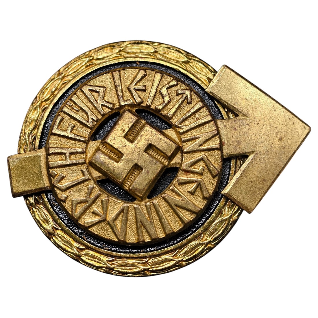 Hitler Youth HJ Leaders Sports Badge in Gold: A gold-tone HJ Leader's Proficiency Badge featuring a central swastika within a black-enameled ring inscribed 'FÜR LEISTUNG' (for achievement), surrounded by an oak leaf wreath, with an arrow motif t