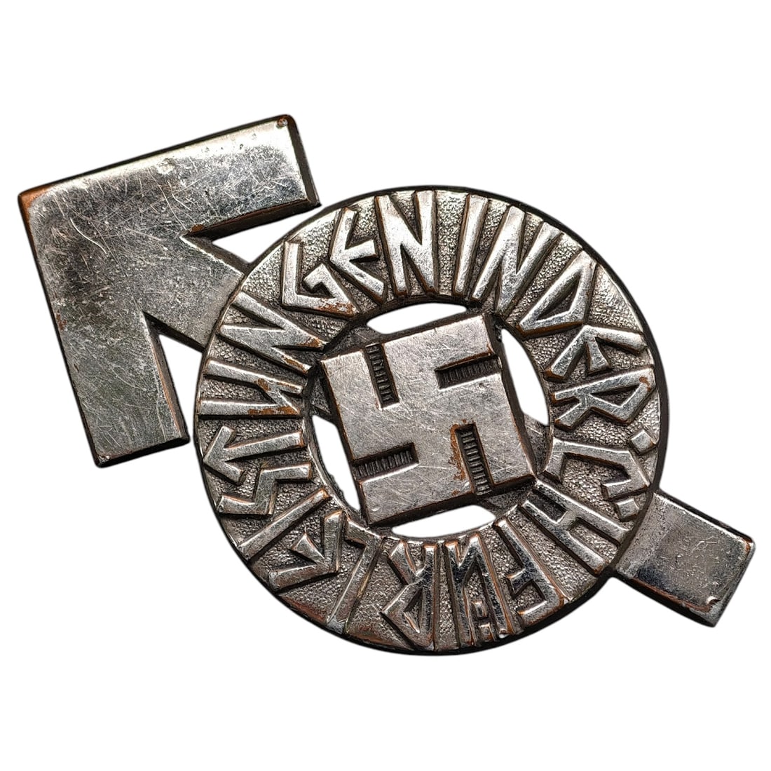 Hitler Youth Proficiency Badge: A proficiency/achievement badge for the Hitler Youth, featuring a stylized runic letter combined with a circular medallion inscribed 'GEBIETSFÜHRUNG' and a central swastika. The reverse is maker-mark
