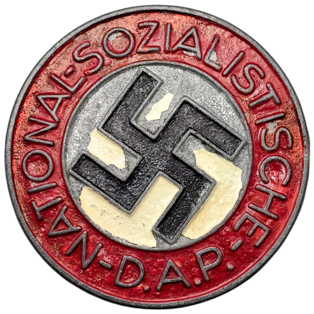 NSDAP Membership Badge: A round metal NSDAP membership badge with red enamel outer ring reading 'NATIONAL-SOZIALISTISCHE N.S.D.A.P.' surrounding a raised black swastika on a field in what appears to be silver. The reverse be