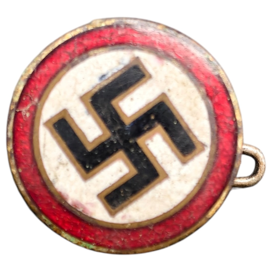 Early NSDAP Supporters Badge: A round enamel membership/supporter's badge with red enamel outer ring, white center field, and black swastika outlined in what appears to be gold-tone metal. Reverse shows a base metal appearing to