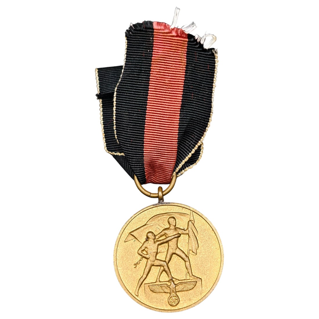 Sudetenland Medal – Third Reich Nazi Era Medal: Third Reich commemorative medal marked 'EIN VOLK EIN REICH EIN FÜHRER' and dated '1. OKTOBER 1938', issued to commemorate the annexation of the Sudetenland. Obverse depicts two male figures raising f