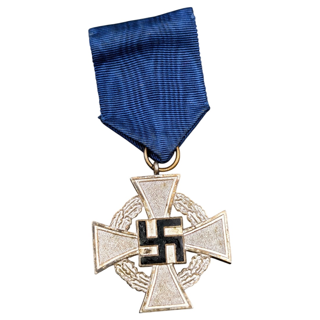 25 Year Faithful Service Medal - Third Reich Nazi Era Medal: A Third Reich era civil service long-service award, cross-shaped with oak leaf wreath surrounds between the arms and a central swastika to the obverse. The reverse bears the inscription "Für treue Di