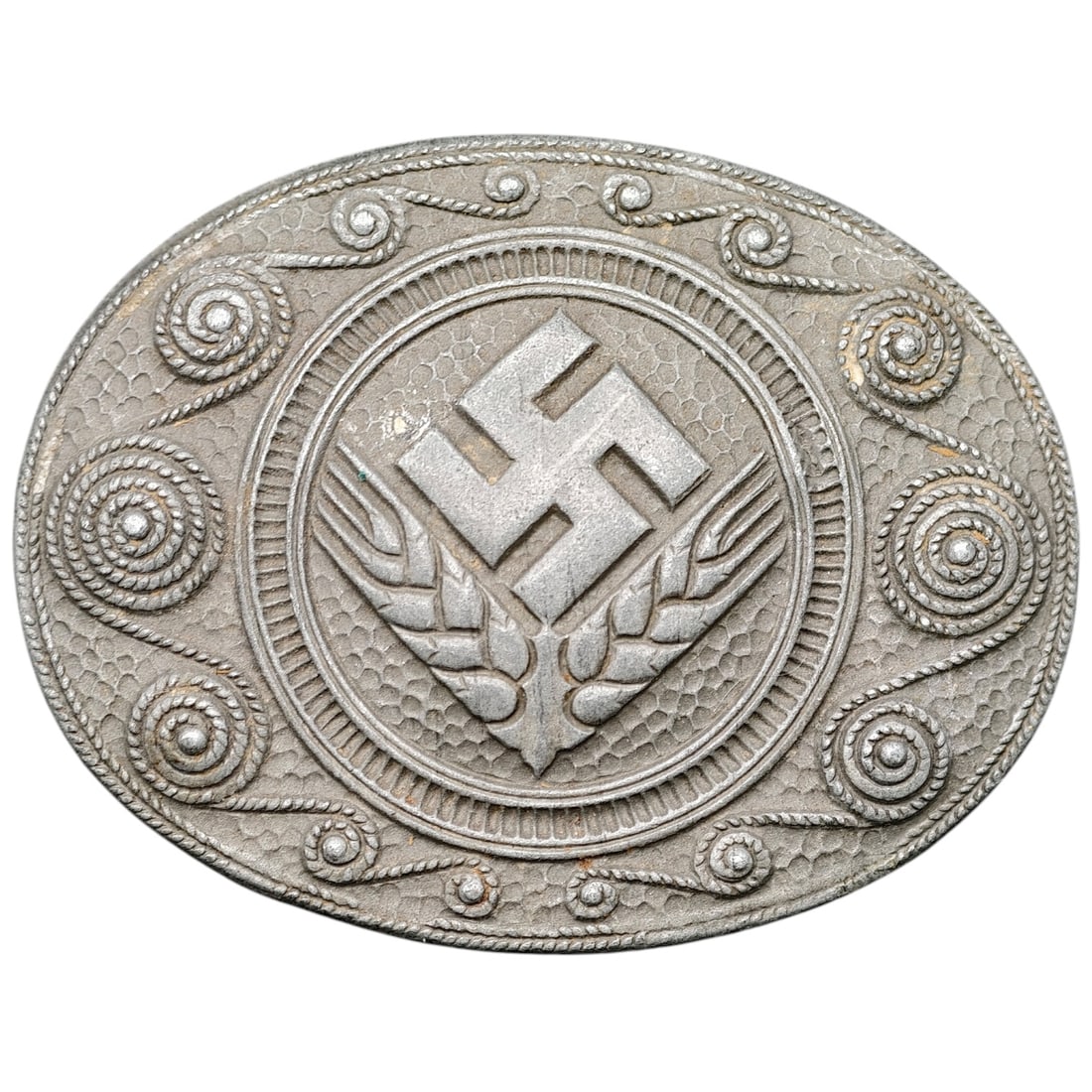 Third Reich Nazi RADwJ Brooch: Oval pin-back brooch featuring a swastika over crossed wheat sheaves, surrounded by a rope-and-scroll decorative border, likely associated with the Reichsarbeitsdienst der weiblichen Jugend (RADwJ).