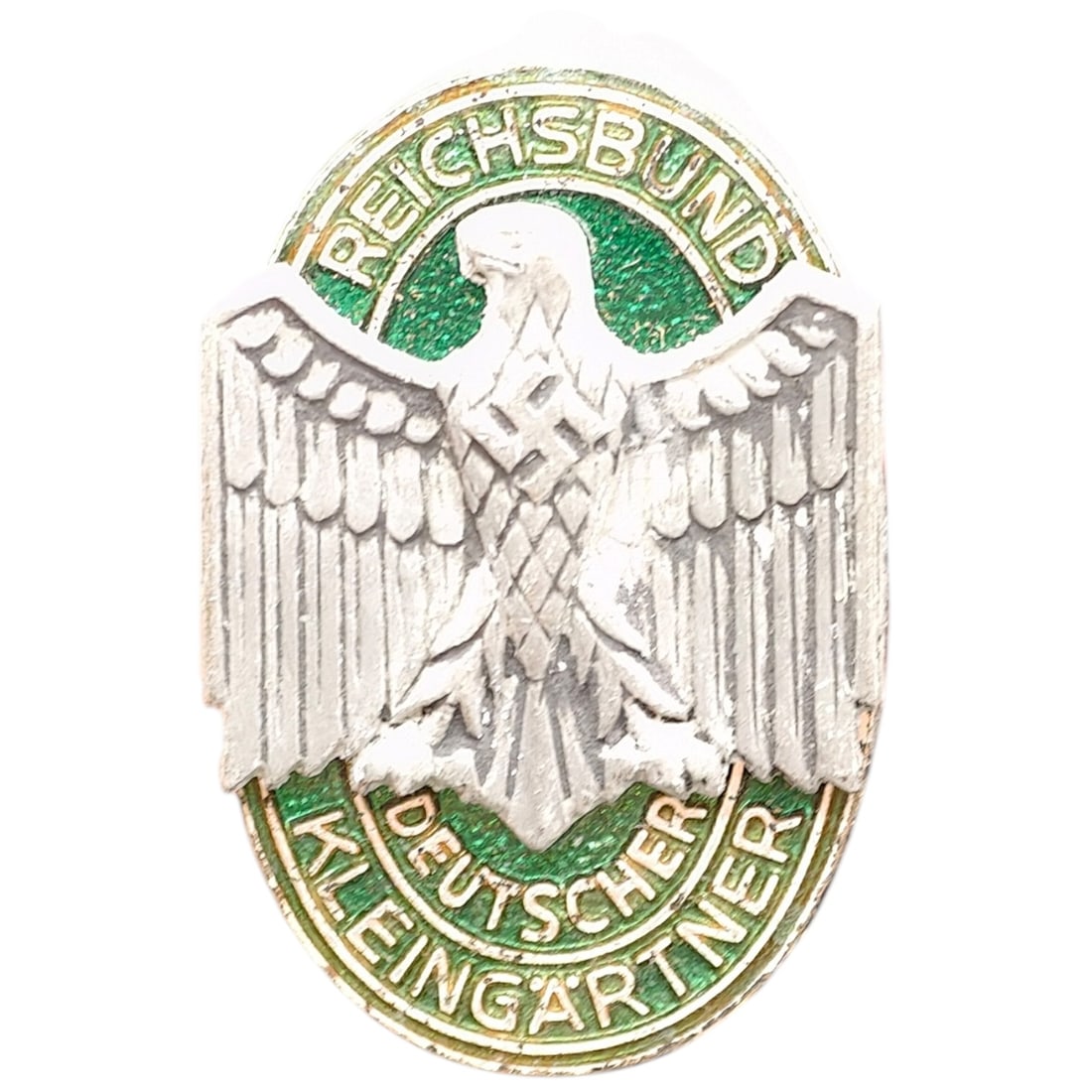 Third Reich Nazi Reichsbund Kleingartner Badge: Membership badge for the Reichsbund der Kleingärtner (Reich Association of Small Gardeners/Allotment Holders), depicting a stylized eagle clutching a swastika above green enamel bands inscribed 'REIC