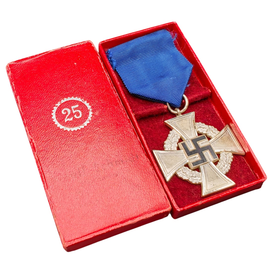 Third Reich Nazi 25 Year Faithful Service Boxed Medal: A cross-form medal in what appears to be silvered metal for 25 years of faithful service (Treudienst-Ehrenzeichen), reverse inscribed 'Für treue Dienste' within an oak leaf wreath, obverse bearing a