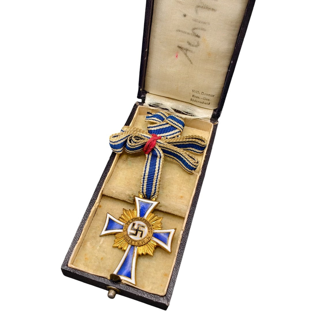 Mothers Cross in Gold – Third Reich Nazi Era Medal in Box: This is a Third Reich era Ehrenkreuz der Deutschen Mutter (Cross of Honor of the German Mother) in gold grade, awarded to mothers of large families. The obverse features a central roundel with a swast