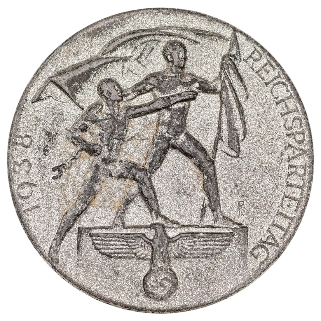 NSDAP Reichsparteitag 1938 Tinnie Badge: Round tinnie badge commemorating the 1938 Reichsparteitag (Nazi Party Rally at Nuremberg), depicting two standard bearers with flags standing above a Wehrmacht eagle. Marked '1938' and 'REICHSPARTEITA