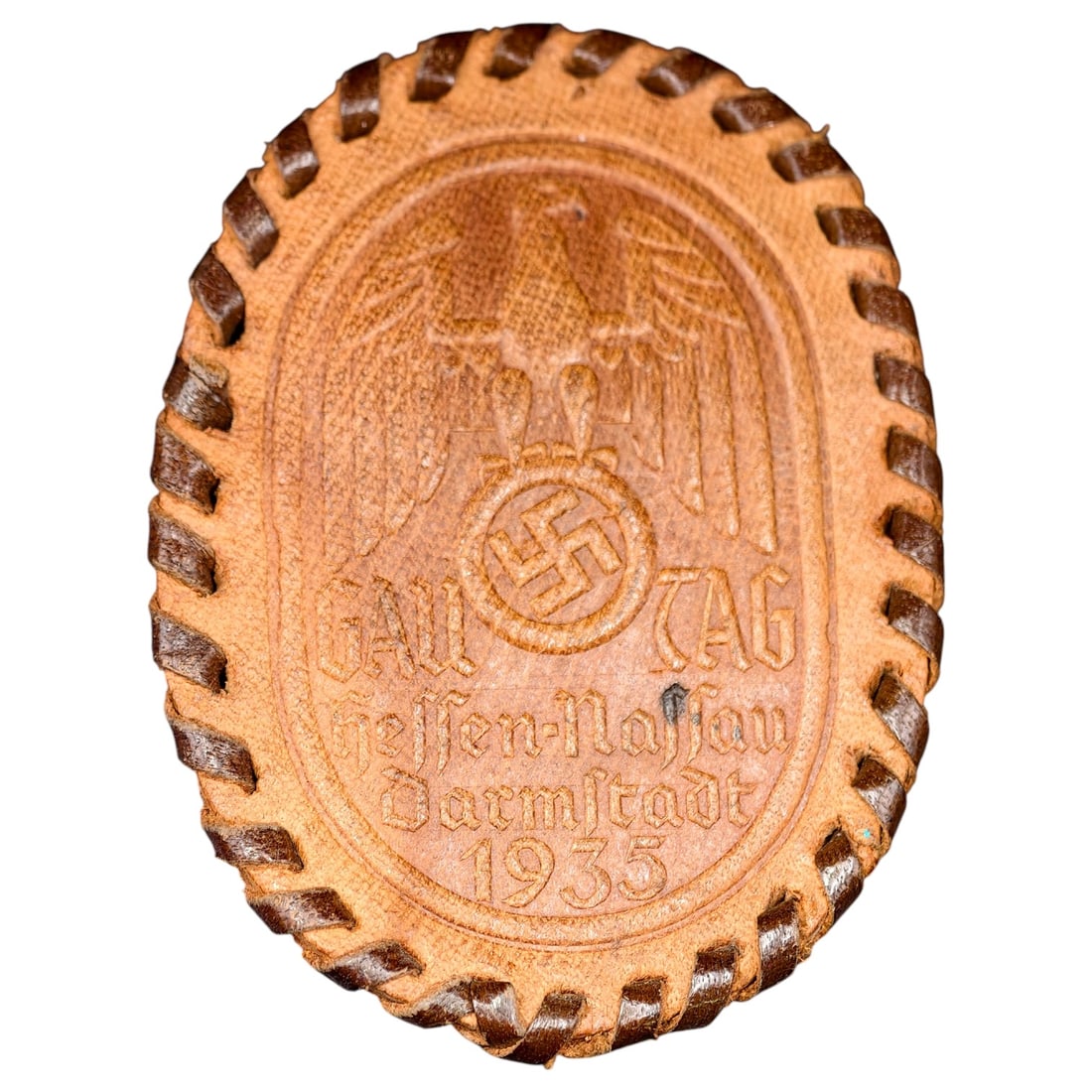 Third Reich Gau Tag 1935 Badge in Leather: Pressed leather commemorative badge for the 1935 Gautag (regional party day) rally held in Darmstadt, Hessen-Nassau. The oval badge features a molded eagle over a swastika wreath with the inscription