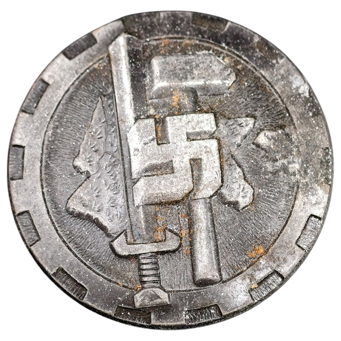 Third Reich Nazi Tinnie Badge: A round badge in what appears to be tin or pot-metal, commemorative, marked on reverse "TAG DES DEUTSCHEN HANDWERKS 1938" (Day of German Craftsmanship 1938) with maker code "F.12." The obverse depicts