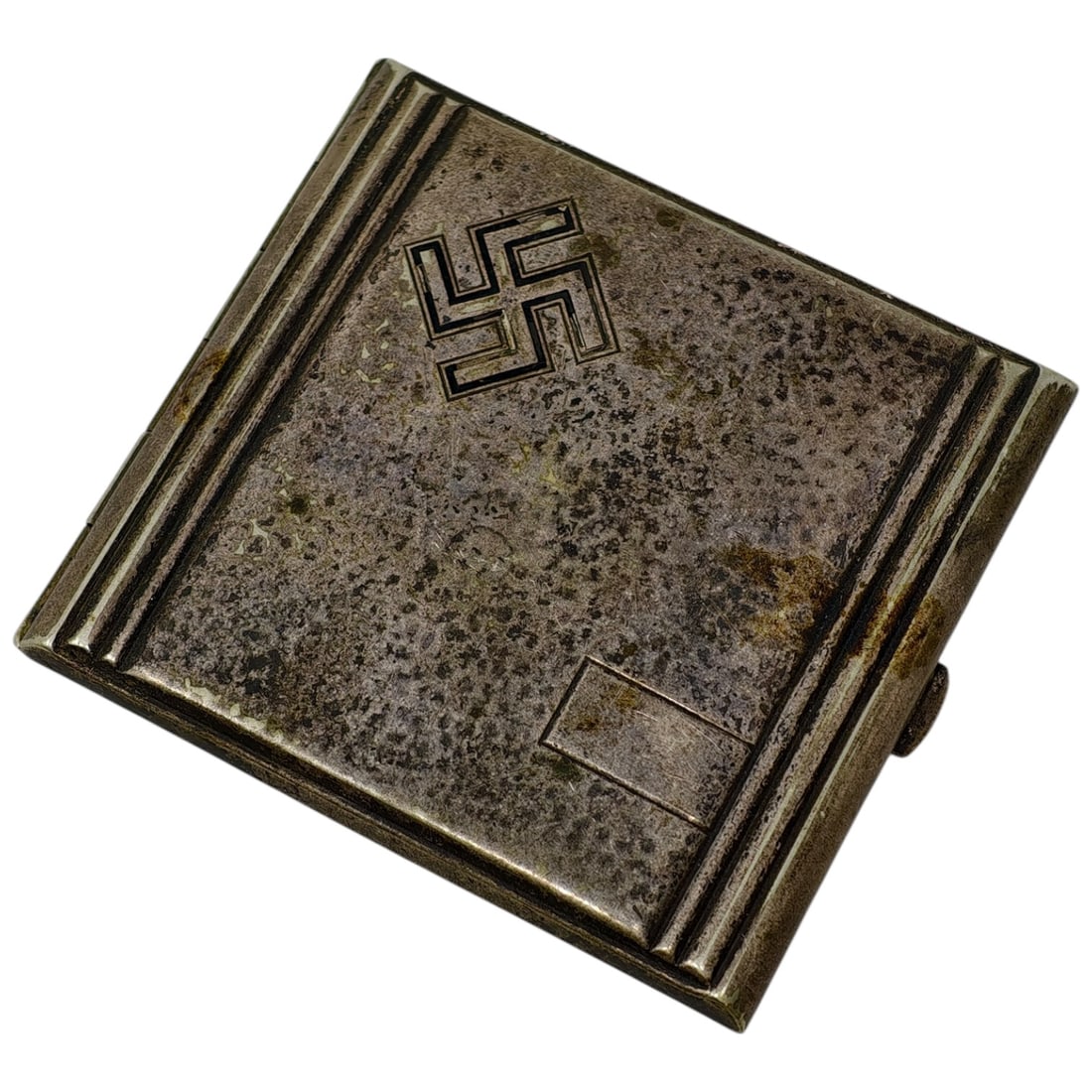 Third Reich Nazi Swastika Cigarette Case: A rectangular metal cigarette case with reeded (ribbed) borders on both front and back panels. The front cover bears an engraved swastika within a raised/recessed rectangular field near the upper
