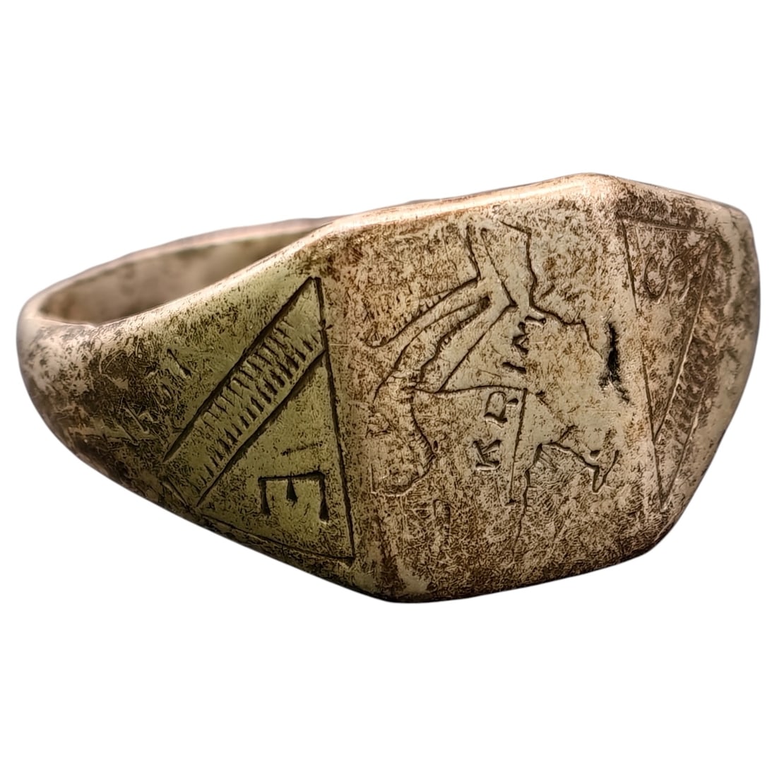 German WWII Krim (Crimea) Campaign Commemorative Ring: A hand-engraved ring in what appears to be white metal, signet-style, commemorating service in the Crimea ("KRIM") campaign, likely dating to the early 1940s Eastern Front period. The bezel bears a cr