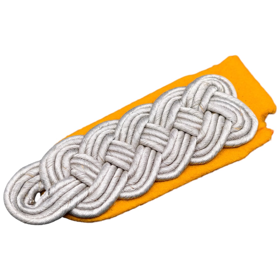 German WWII Officer's Shoulder Board with Yellow Branch Backing: A single shoulder board (schulterstück) in what appears to be silver, for an officer's tunic, woven in a plaited cord pattern with a rounded button loop end. The reverse is faced with yellow wool clo