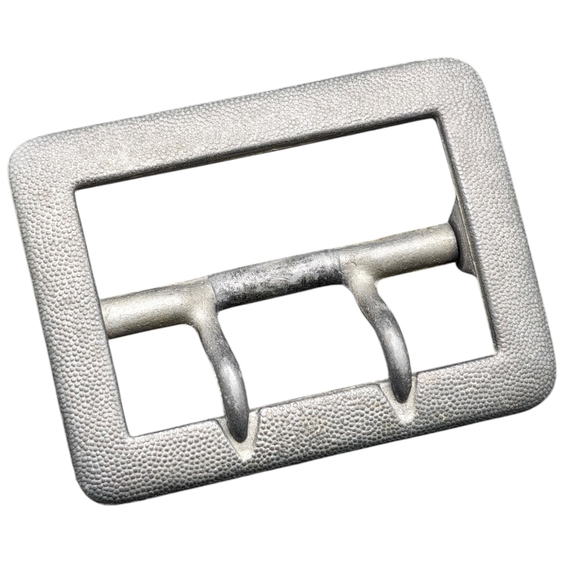 German WWII Rectangular Frame Belt Buckle, DRGM Marked: A plain rectangular double-prong frame buckle in cast lightweight metal, believed to be aluminum or zinc alloy, with a pebbled/textured outer face. Reverse is stamped 'DRGM' along with a maker mark wi