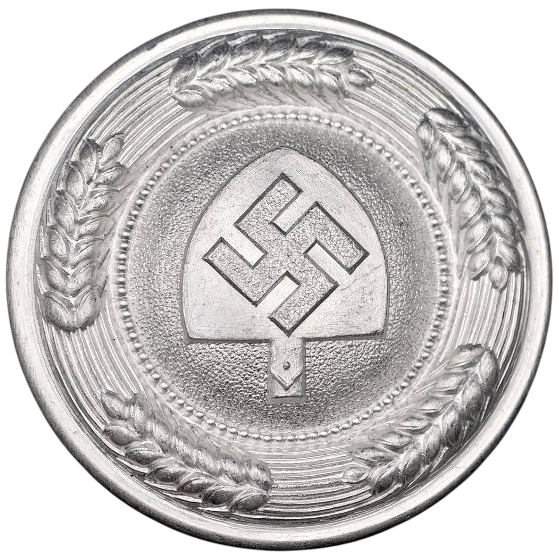 Third Reich Nazi RAD Belt Buckle: A round-form German RAD (Reichsarbeitsdienst) officer's belt buckle in metal that appears to be white/nickel-finish, featuring a central raised swastika on a spade-shaped shield surrounded by a beaded