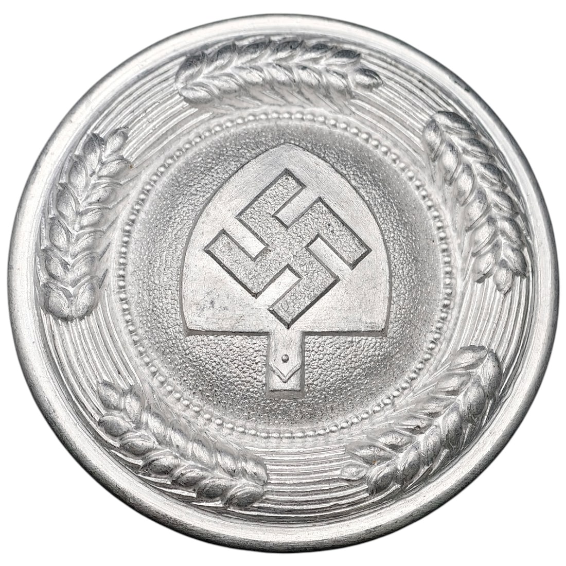 Third Reich Nazi RAD Belt Buckle: A circular buckle in what appears to be aluminum featuring a raised swastika within a shield-shaped panel, surrounded by a beaded circle and a wreath of oak or wheat sheaves. The reverse shows the des