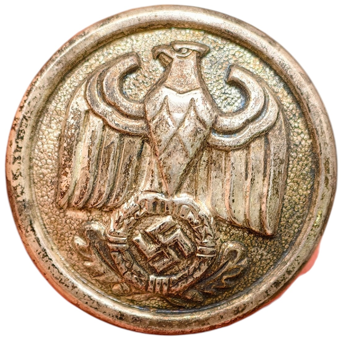 Nazi German Uniform Button - Diplomatic / Eastern Occupied Territories - RARE: A large domed uniform button featuring the German national eagle (Reichsadler) grasping a wreathed swastika. The reverse is maker-marked "BRÜDER SCHNEIDER AG WIEN," a known Austrian button and insign