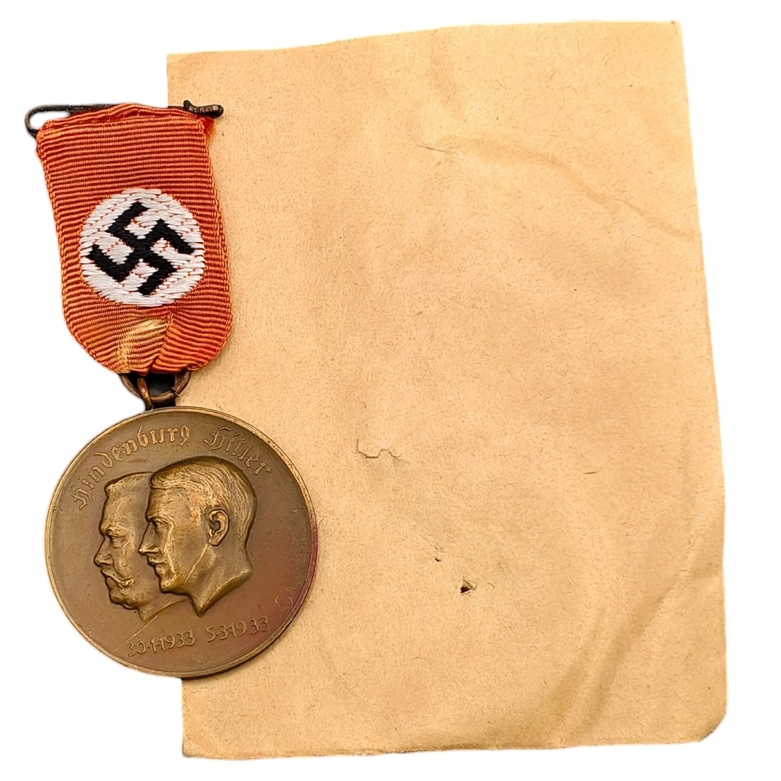 Adolf Hitler Hindenburg Commemorative Medal in Factory Envelope: A medal in what appears to be bronze commemorative marking the January 30, 1933 - March 5, 1933 period, featuring conjoined profiles of Hindenburg and Hitler on the obverse with dates '30.1.1933' and 