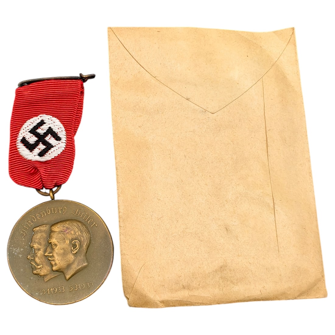 Adolf Hitler Hindenburg Commemorative Medal in Factory Envelope: Adolf Hitler Hindenburg Commemorative Medal in what appears to be its factory envelope. Factory find.
