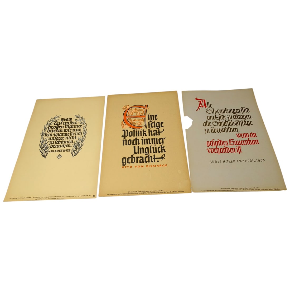 German WWII Wochenspruch der NSDAP Weekly Slogan Sheets - Set: A set of printed weekly slogan sheets (Wochenspruch der NSDAP), each featuring a quotation attributed to historical German figures (Friedrich der Große, Gorch Fock, and Ulrich von Hutten) with styliz