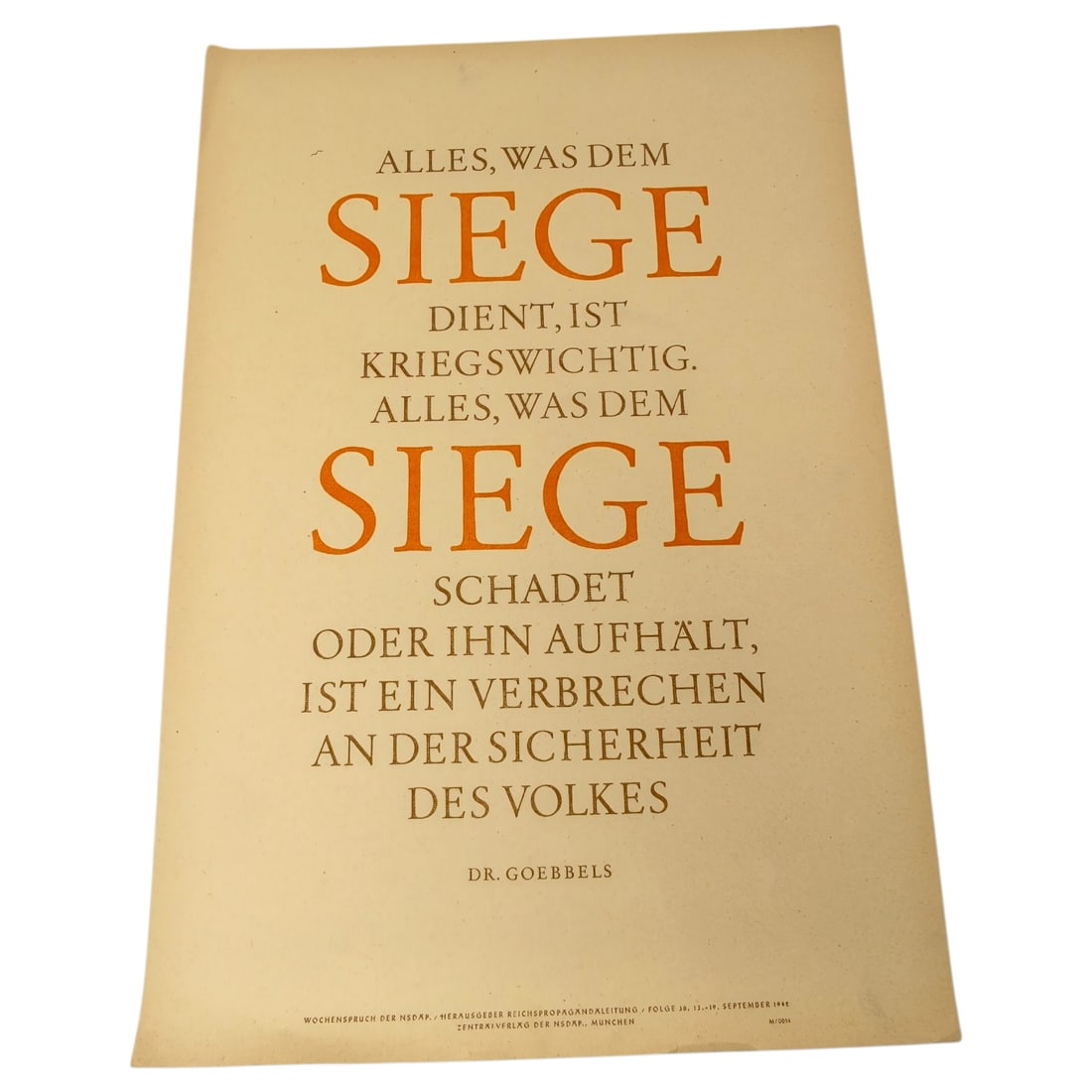 German WWII NSDAP Wochenspruch Propaganda Poster Quoting Dr. Goebbels: A printed propaganda placard titled "Alles, was dem Siege dient, ist kriegswichtig..." attributed to Dr. Goebbels, issued as part of the weekly NSDAP slogan series (Wochenspruch der NSDAP). Printed in