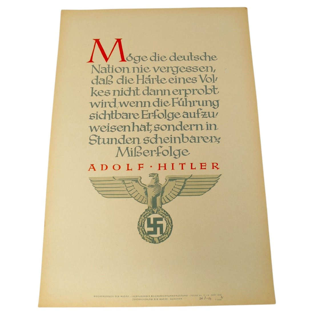 German WWII 'Wochenspruch der NSDAP' Propaganda Page with Hitler Quote: A printed page from the 'Wochenspruch der NSDAP' (Weekly Slogan of the NSDAP) series, featuring a quotation attributed to Adolf Hitler in stylized red and grey lettering. Below the text is a printed R