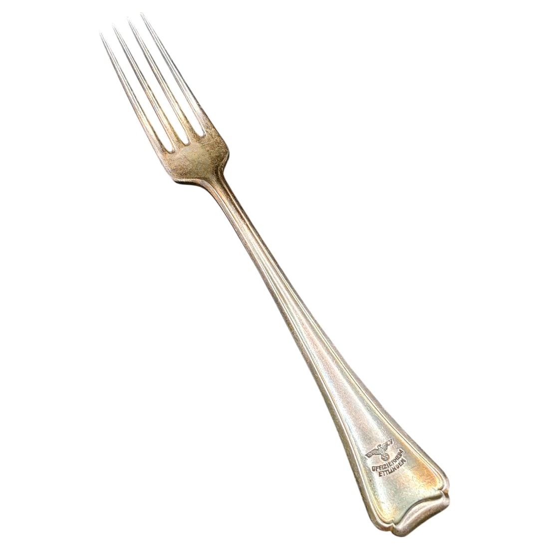 Third Reich German Army Officers' Mess (Offizierheim Ettlingen) Fork: A dinner fork in what appears to be silver plate stamped with the Wehrmacht eagle and swastika above the inscription "OFFIZIERHEIM ETTLINGEN" (Officers' Home Ettlingen), indicating issue to an army of