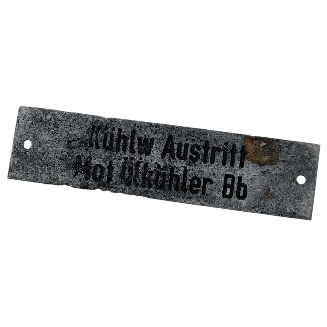 German WWII Kriegsmarine/Aircraft Equipment Data Plate - 'Kühlw Austritt Mot Ölkühler Bb': A small rectangular data/identification plate stamped with the German text 'Kühlw Austritt Mot Ölkühler Bb', translating roughly to 'Coolant Outlet, Engine Oil Cooler, Left/Port'. This type of