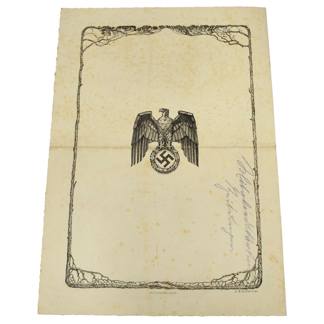 Deutsche Reichspost Telegram Form with Reichsdruckerei Eagle Cover: A folded Deutsche Reichspost telegram, printed on a decorative Reichsdruckerei cover sheet bearing an eagle and wreathed swastika device within an ornate pine-branch border, with a pencil-signed dedic