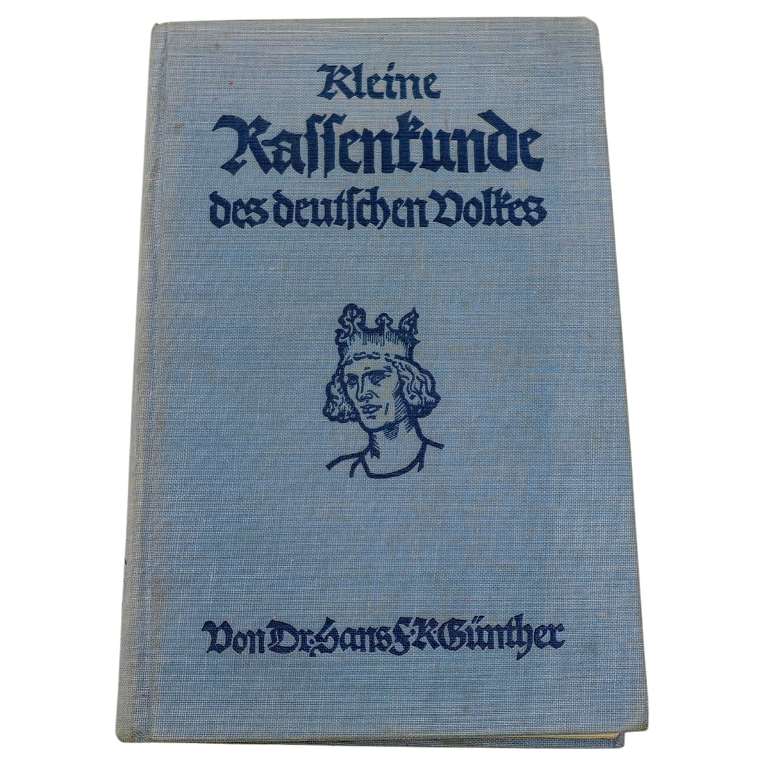 German Book "Kleine Rassenkunde des deutschen Volkes" by Dr. Hans F.K. Günther, with Kriegsmarine: A hardbound German-language book titled "Kleine Rassenkunde des deutschen Volkes" (Short Racial Science of the German People), authored by Dr. Hans F.K. Günther, bound in a light blue cloth cover wit